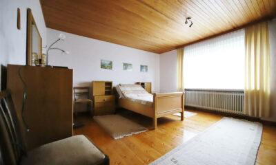 Schlafzimmer I im EG (Landhaus, Aurich-Tannenhausen)